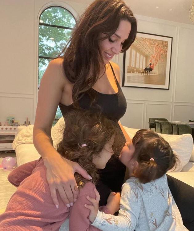 On November 25 2021, Sam and Snez took to Instagram to share the exciting news that they're expecting their third child together - another daughter!
<br><br>
"Our 'little' family is about to become 6 with another little girl !!!," Sam captioned this adorable photo of Willow, three, and Charlie, two, kissing their mum's bump.
<br><br>
Sam revealed that they broke the news to Eve, Snez's teenage daughter from a previous marriage, two weeks before.