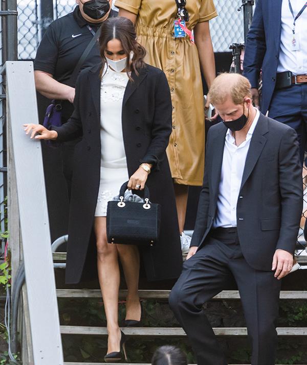 Meghan's trip to New York in September proved the duchess can rock daywear just as much as her famous red carpet looks.
<br><br>
Leaving the Global Citizen concert in Central Park, Meghan added this structured black coat to her Valentino mini. She took inspiration from Diana with this Dior Lady D-Lite bag, which retails for around $6800.