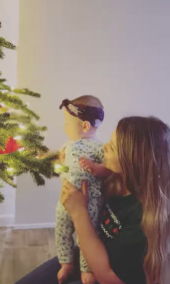 **Bindi Irwin** 
<br><br>
Bindi Irwin is preparing for her daughter Grace's first Christmas by showing the bub her first tree, and you can watch her adorable reaction in the video below.