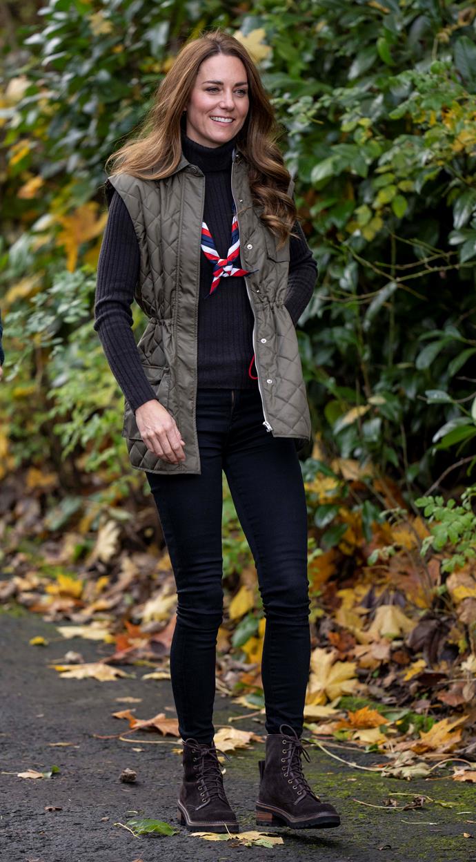 To visit Scouts, Kate understood her assignment well with this vest and black boot combo.