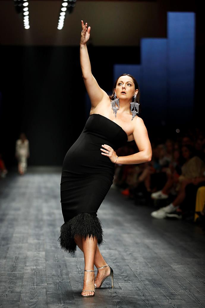 Even on the runway, Celeste's sense of humour is her best accessory. She struck a cheeky pose in this feathered Rachel Gilbert gown during the Melbourne Fashion Festival in March 2020. We loved the giant earrings too!