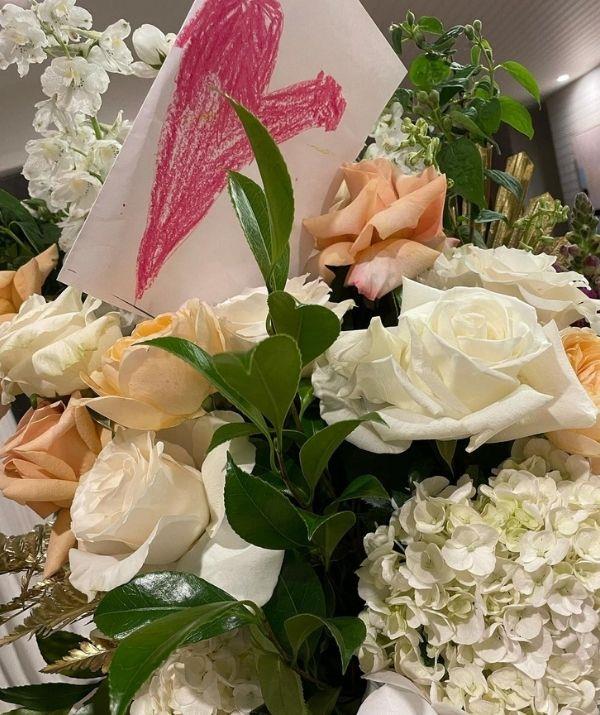 For Carrie's 41st birthday on December 3, 2021, the radio host was treated to a gorgeous bouquet of roses, with a handmade card from her children and partner. 
<br><br>
She shared a portrait of the gift on her Instagram and expressed the love she felt from the gesture. 
<br><br>
"Thanks for the birthday love yesterday ❤️ and thanks babe @chriswalkertv for the gorgeous gifts and cards from the kids 🥰 flowers are heaven 💋," she penned.