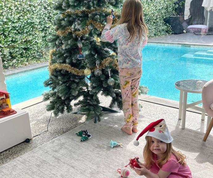 **Fifi Box**
<br><br>
A besotted Fifi shared her glee watching Trixie and Daisy decorate their tree, "I love watching the girls decorating the tree together, Daisy dropped all the glass baubles so no more of those til they're teenagers 🥰🎄💕."