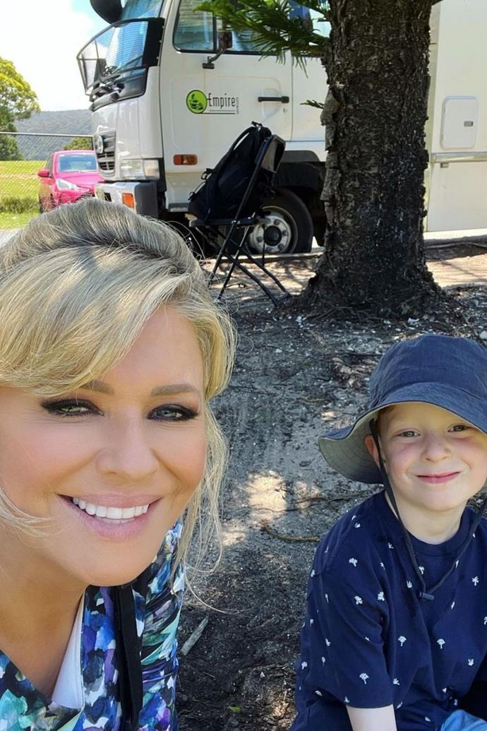 Could Henry catch the show biz bug? Em took her son to the *Home and Away* set for a special day of filming, and her castmates were thrilled to see him. 
<br><br>
The 52-year-old posted a picture of them on set while she was in costume, and she captioned the memorable snap, "I had a very special visitor at work today 💙 Lucky Mama 🥰."
 <br><br>
Her co-stars filled the Instagram post with comments praising little Henry. Georgie Parker wrote, "Look at that smile ❤️❤️❤️🙌," Lynne McGranger gushed, "Hello loves 💙💖🙏🥰🥳," and newbie Nicholas Cartwright commented, "Cuuuute! ❤️."