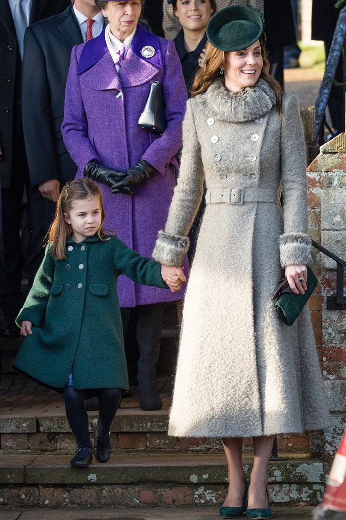 Charlotte stole the show with her adorable little curtsey as the Queen arrived.