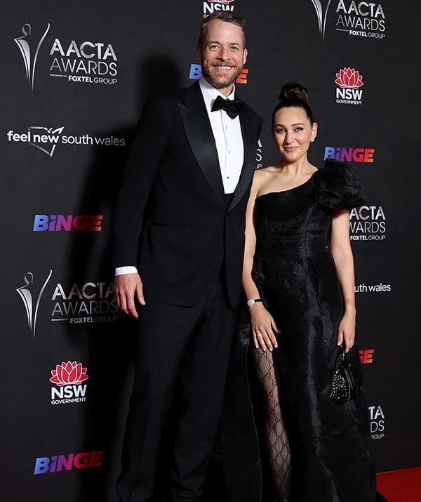Comedian Hamish Blake and his wife Zoe Foster Blake wowed on the red carpet, with the beauty guru opting for a thigh-split gown and statement stockings.