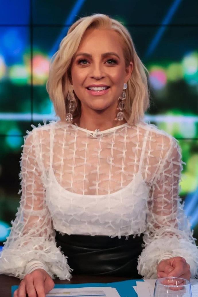 The mother-of-three is a big fan of Jason Grech, and wore this sheer frilly top to host *The Project.*