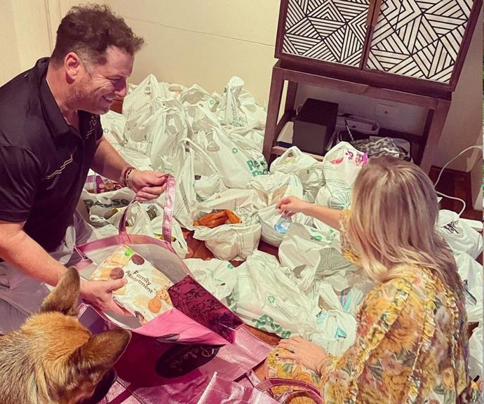 **Jasmine and Karl Stefanovic** 
<br><br>
The Stefanovic's chose a humanitarian route to ring in the days before Christmas by putting together hampers for those in need.
<br><br>
They worked together to fill up bags with essentials, and Jasmine captioned their efforts, "Hampers for Christmas for those in need. @plates4mates_sydney Thank you for organising this amazing initiative @itsmondotcom you are such a kind and generous soul."