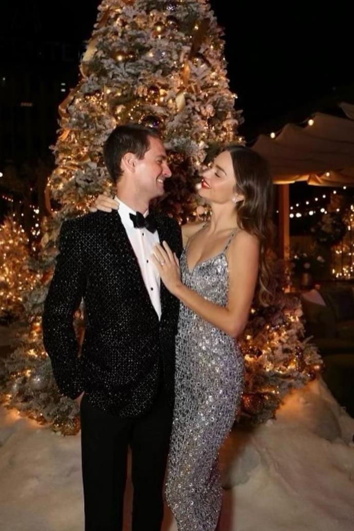**Miranda Kerr and Evan Spiegel**
<br><br>
Miranda and her husband looked suave in their sparkly Christmas themed outfits on a night out for the holidays. Because it doesn't snow in Los Angeles, the couple had to make do with some faux snow, but they made the most of their warmer climate, which the model would be used to growing up in Australia.
<br><br>
She simply captioned the loved-up post, "🎄Happy Holidays 🎄."
