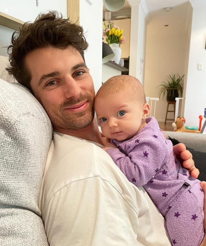 Matty J snuggles up with their youngest daughter, Lola.