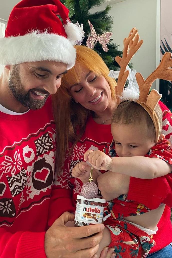 **Cameron Merchant and Jules Robinson**
<br><br>
The former *MAFS* contestants posed in front of their Christmas tree wearing matching themed sweaters, and they placed reindeer antlers on their son Oliver's head.
<br><br>
"Christmas sweater game on point!🎄🙌🏽✨😂," wrote Cameron.