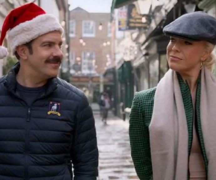 **Ted Lasso (Apple TV +)**
<br><br>
***Season 2, Episode 4 - Carols of the Bells***
<br><br>
The wholesome series caught the hearts of many audiences this year, and its Christmas episode stood out because it broke away from the show's regular storyline. The always optimistic lead Ted is in an emotional funk enduring the holidays away from his family, and he turns to drinking.
<br><br>
However, he receives some pure friendship from Rebecca, who is on her journey to become a better person and takes him to listen to carols and bring toys to children. There is also a Christmas miracle, a festive party, and plenty of touching moments to inspire some merry feels.