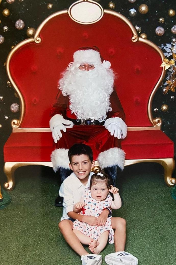 **Ada Nicodemou**
<br><br>
Ada and her family are celebrating some firsts and lasts this Christmas. Her niece and goddaughter Sofia is ringing in her first time meeting Santa, while her son Johnas is gearing up for his final goodbyes.
<br><br>
The *Home and Away* star posted a picture of the cousins cuddling in front of Santa, and in her caption she mused over the double milestone.
<br><br>
"Cuteness alert ❤️❤️ our first Christmas photo with our beautiful Sofia and probably the Last Santa photo with Johnas ( he knows 😂) Merry Christmas 🎄🎅," she shared.
