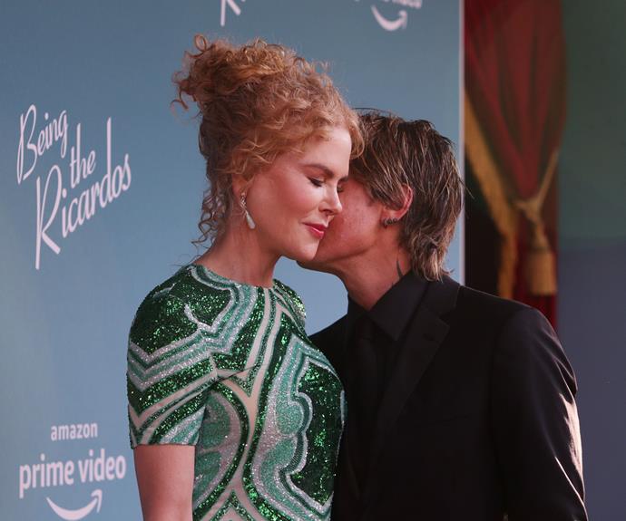 Nicole's husband of 15 years, Keith Urban, stole a kiss on the red carpet.
