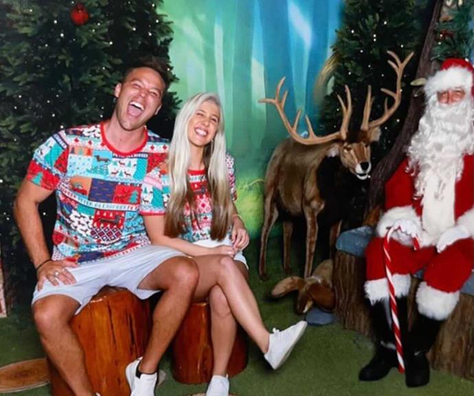 **Lincoln Lewis**
<br><br>
The *Home and Away* alum and his girlfriend Pandora Bonsor got into the festive spirit by posing with Santa at their local shopping centre - and by the looks of their grins, they couldn't be more excited for Christmas! 
<br><br>
"I somehow talked Linc into getting a Santa photo & matching T shirts," Pandora captioned this sweet post.