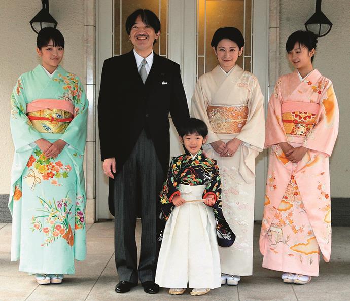 Princes Mako (left) poses with her brother, Prince Hisahito (C), father Prince Akishino (2nd from L), mother Princess Kiko (2nd from R) and sister Princess Kako (R) at the imperial family's shared house.