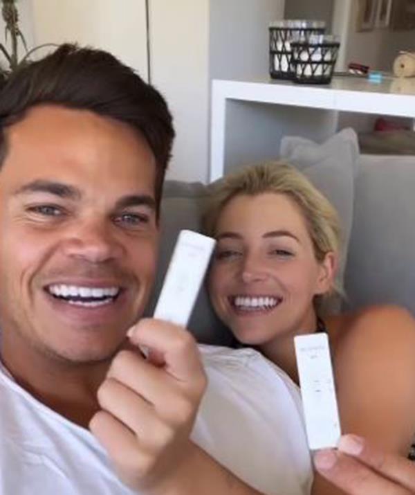 **Holly Kingston and Jimmy Nicholson**
<br><br>
The *Bachelor* sweethearts tested positive to COVID after New Year's Eve and they isolated in their Bondi apartment.
<br><br>
The pair announced the news to their followers by posting a photo of them holding up their positive rapid antigen tests. 
<br><br>
"Ah well," Jimmy said, with Holly adding: "Another one bites the dust."
<br><br>
But the couple made the most of their isolation period by doing odd jobs around their beachside pad, including painting their balcony. 
<br><br>
"Have been waiting to paint the balcony railing for a long time now. Covid project 1/16730 here we come," Jimmy captioned a clip of their renovation.