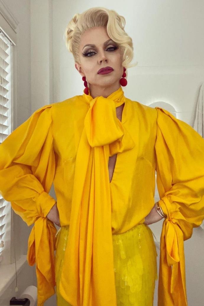 Yellow is to die for on Courtney, and while the blouse is everything, it's the deep burgundy lipstick and earrings that elevate this outfit.