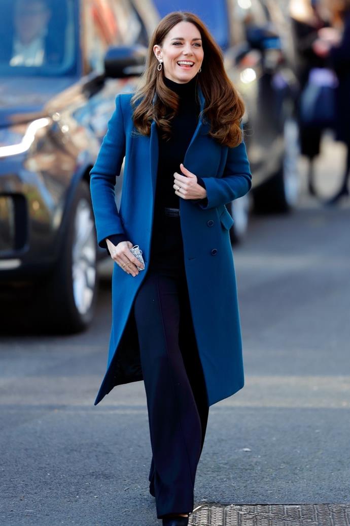 Kate was a vision in petrol blue.