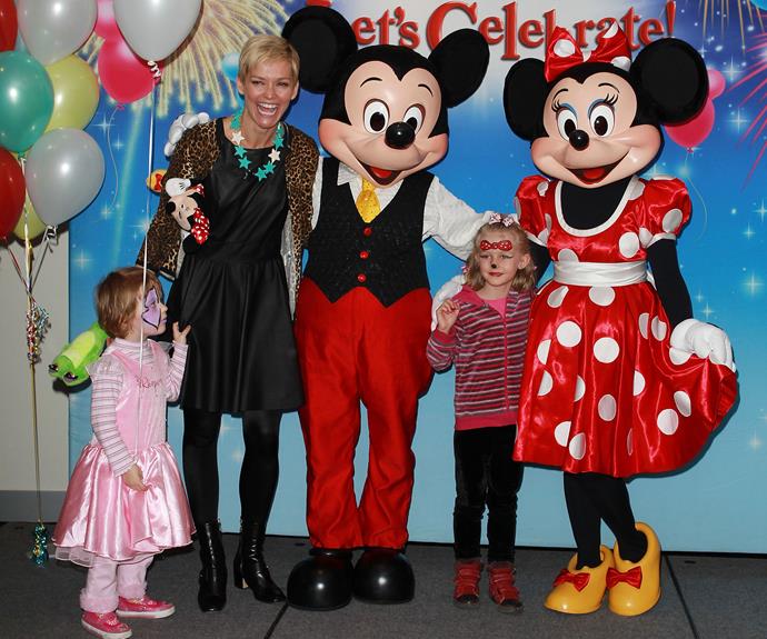 Little Giselle didn't look sure when she met Minnie and Mickey Mouse in 2012, but Allegra was all smiles.