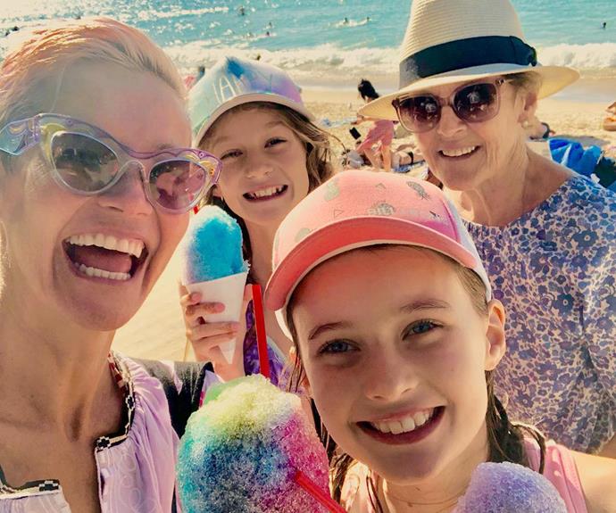 Jess' mum joined the girls for a colourful beach day in 2018, the 51-year-old captioning this snap: "Three generations of strong women @marmirowe (and little women), blessed to be able to have the freedom and choice to be who we want to be! 🌈🧜🏻‍♀️😻"