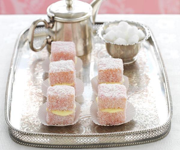 **White chocolate raspberry lamingtons**
<br><br>
A delightful twist on the old classic, this recipe is perfect for when you want something a little prettier on your plate. Plus, they taste divine.
<br><br>
See the full *Australian Women's Weekly* recipe [here.](https://www.womensweeklyfood.com.au/recipes/white-chocolate-raspberry-lamingtons-31623|target="_blank")