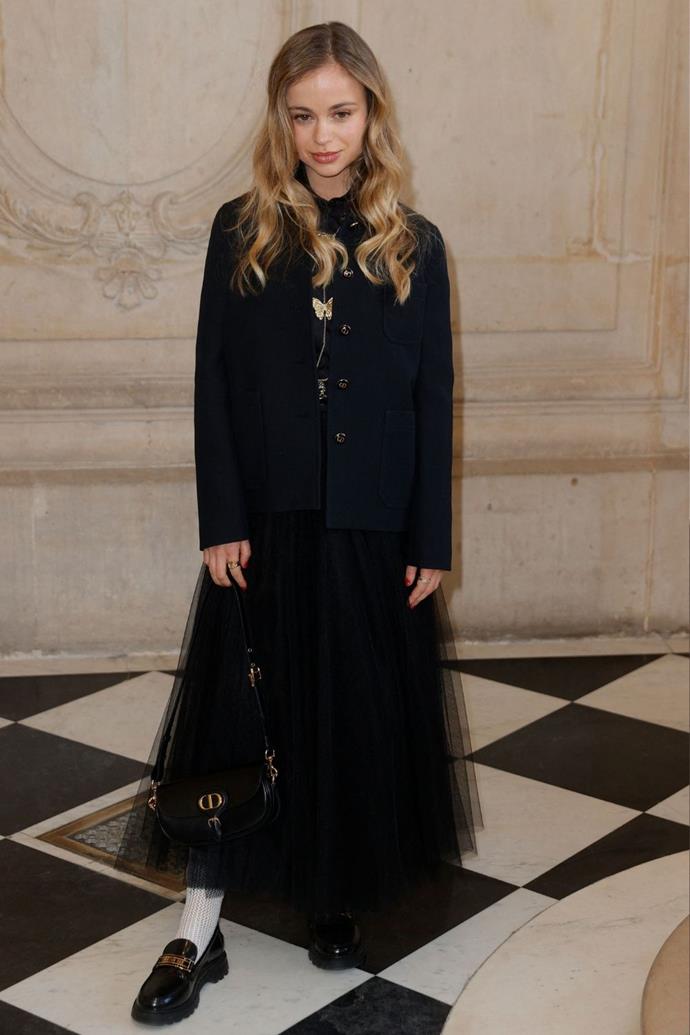 Amelia viewed Dior Haute Couture's 2022 show, and her gothic tulle skirt paired with a structured black blazer is an exercise of creative styling.