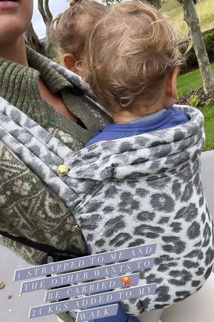 During a trip away for Buddy's 35th birthday, Jesinta went for a walk with her babies. But the stroll became a workout when her daughter insisted on being held even though Rocky was strapped to Jes' chest. 
<br><br>
The model took a snap of her struggle and captioned it, "1 strapped to me and the other wants to be carried, 24 KGS added to my walk."