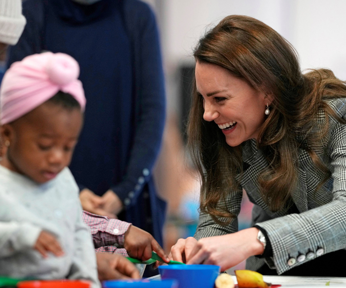 Catherine, Duchess of Cambridge met with local mothers and children at PACT (Parents and Communities Together).