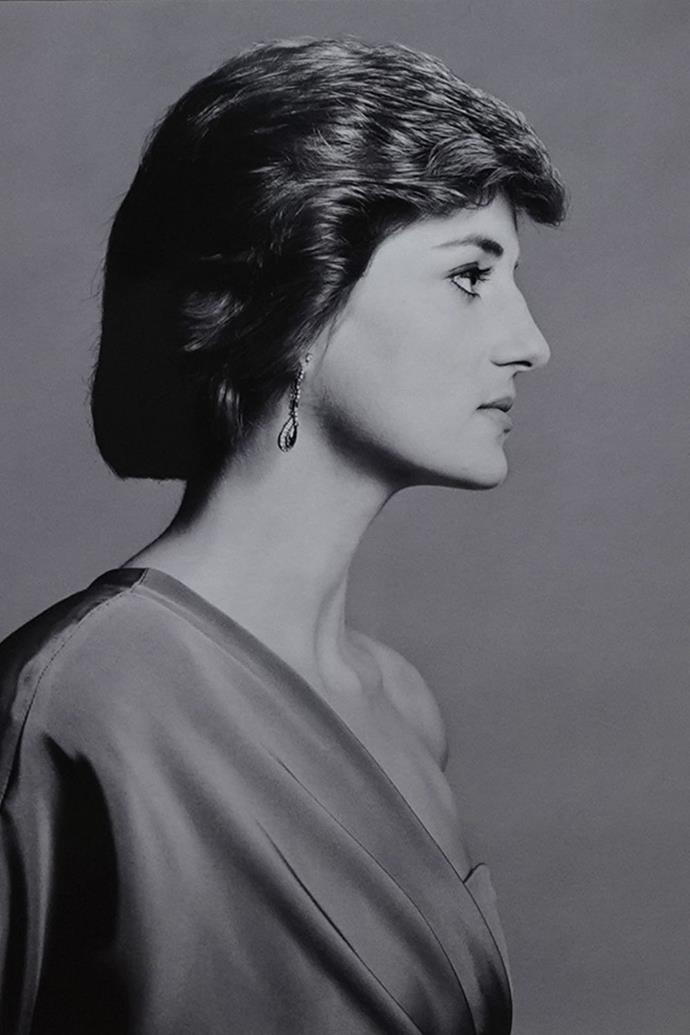 The composition of this shot showcases Diana in thought.