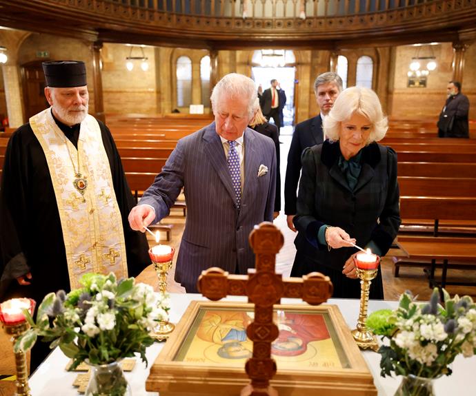 Charles and Camilla lit candles and lay flowers for the people of Ukraine.