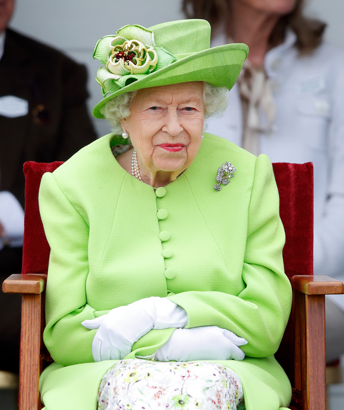 Her Majesty loves a pop of colour! She chose this vibrant green coat and matching hat to attend The Royal Windsor Cup in 2021.