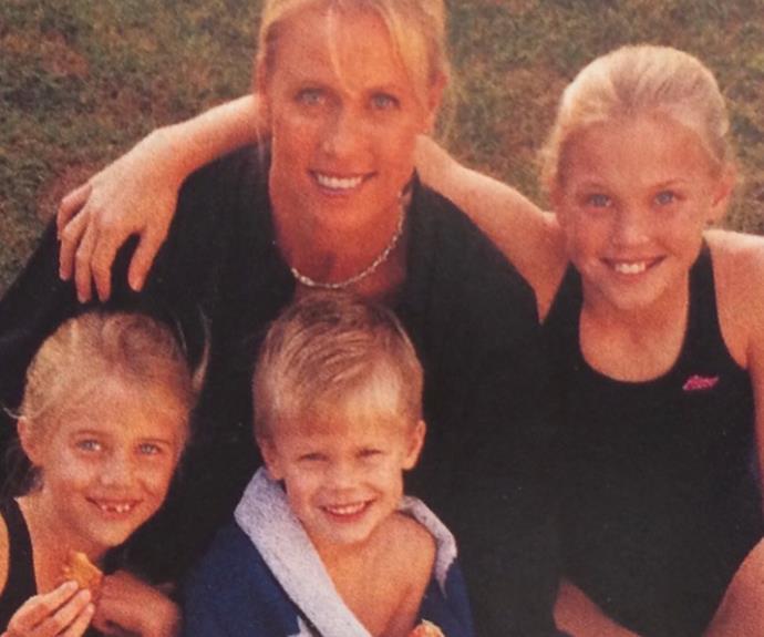 Lisa with the couple's three children in the late '90s, before her marriage to Grant broke down.