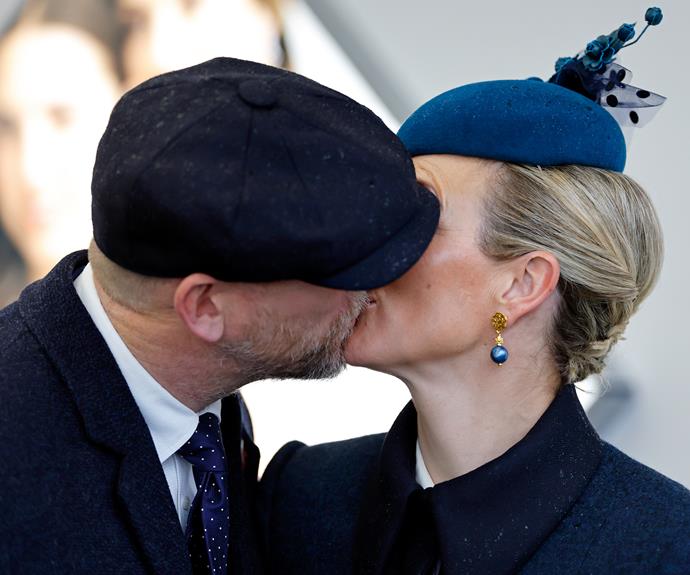 Zara and Mike Tindall stole a sweet kiss at Cheltenham Festival in March 2022, a very rare PDA for the royals.