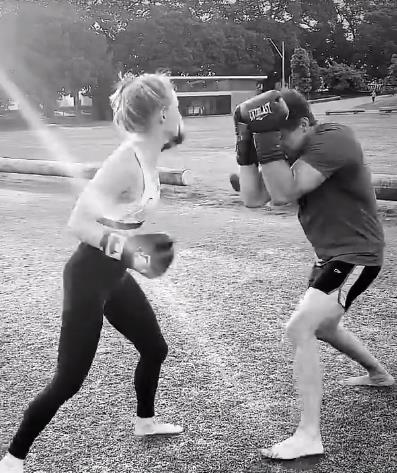 Anna went hard in her training, pummelling Tim in a boxing match.