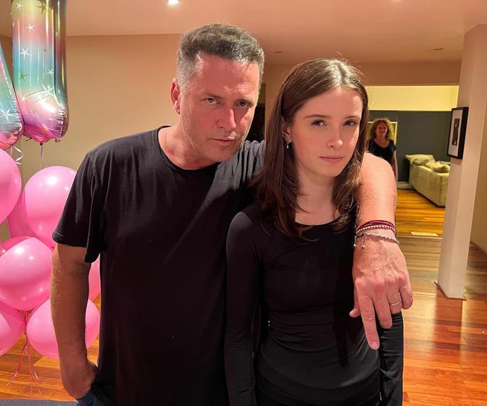 Karl posed with his daughter for her birthday.