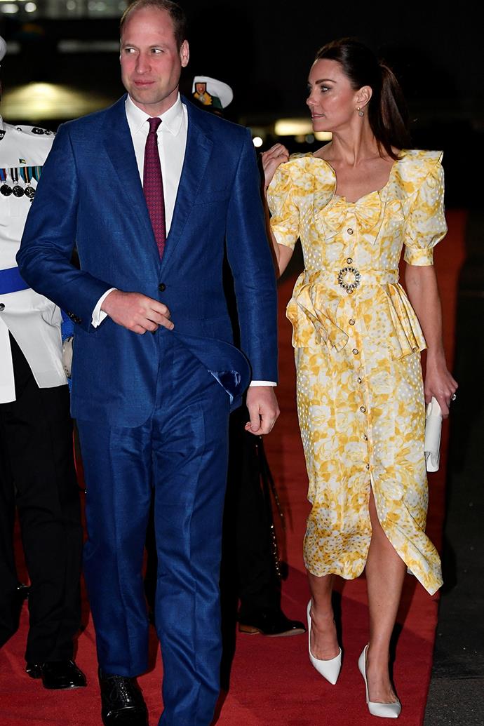 For her final appearance of the tour, Catherine chose an '80s inspired belted dress by Alessandra Rich which retails at an impressive $2,800. She paired the yellow printed frock with white Gianvito Rossi pumps and a matching Ferragamo clutch.
