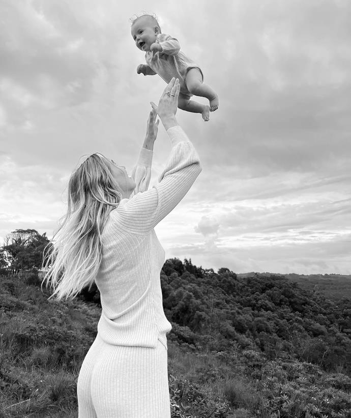 This sweet black and white snap shows the bond between mother and daughter.