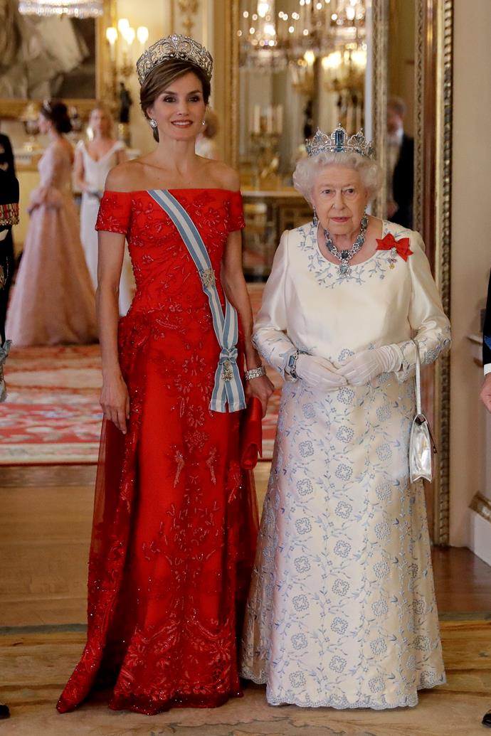 In 2017 Letizia donned this off-the-shoulder beaded red gown for a meeting with Queen Elizabeth II in London.
