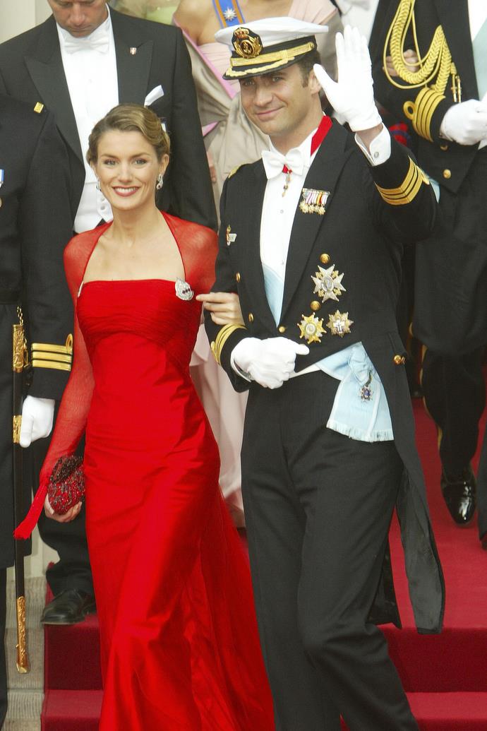 In fact, Letizia has been wearing red since the start of her royal tenure, donning this crimson gown for Crown Prince Frederik of Denmark and Mary Donaldson's wedding in 2004.