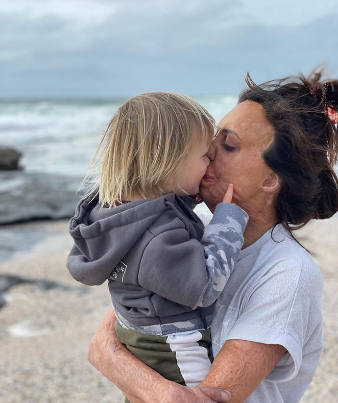 Kisses for mama! Turia shared this sweet mother-son bonding moment as she called for support for victims of the Queensland and NSW floods.