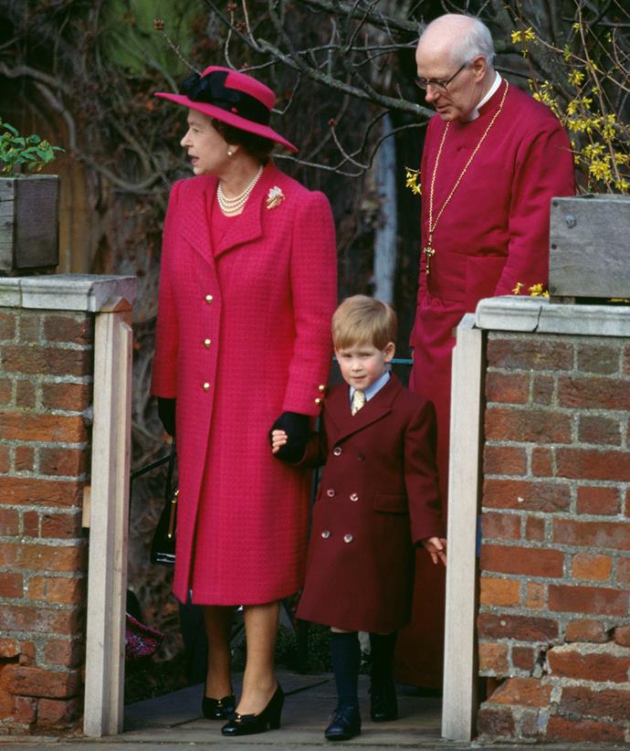 The following year she and Prince Harry opted for complimentary red coats, the young prince dressing in a slightly darker hue.