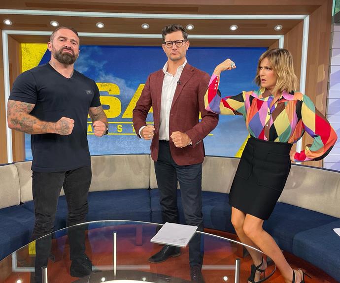 Kylie poses on *The Morning Show* with Rob Mills and *SAS Australia* Chief Officer Ant Middleton.