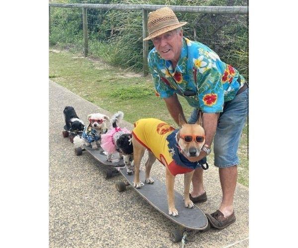 Brian now has four skateboarding dogs.
