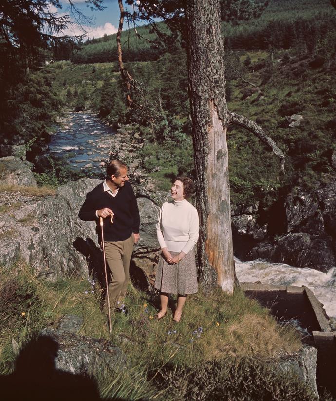 Queen Elizabeth II and Prince Philip spend much of their private time at their Balmoral Estate in Scotland, where this intimate picture was taken on their Silver Wedding anniversary year in 1972.