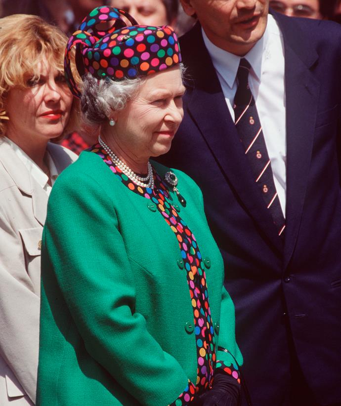 In 1993 she headed to Budapest where she showed off her colourful style in this matching polka-dot hat and suit by Marie O'regan and Ian Thomas respectively.