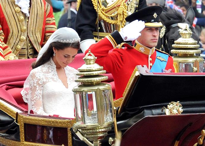 The newly minted Duke and Duchess of Cambridge rode through London by carriage after the Westminster Abbey service, but as a mark of respect Catherine would bow her head every time William would salute.