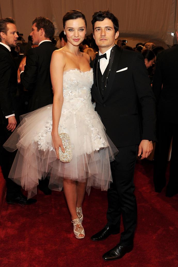 **HIT:** Miranda Kerr in Marchesa, 2011.
<br><br>
This white swan-style frock was a total hit for Miranda, who looked divine on then-husband Orlando Bloom's arm.