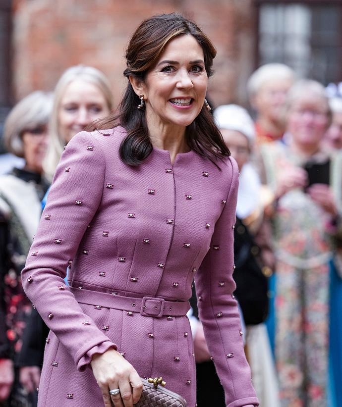 **January 2022, Denmark**
<br><br>
A vocal supporter of sustainable fashion, Mary recycled this embellished pink Claes Iversen coat for an outing to open the exhibition "Mary and the Crown Princesses" before her birthday in 2022.