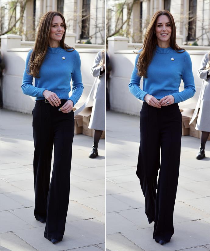 **March**
<br><br>
Catherine wore an Alexander McQueen cashmere sweater in blue - one of Ukraine's national colours - for an outing to support relief efforts in early 2022. Her Jigsaw wide-leg trousers were the perfect addition to the smart casual look.